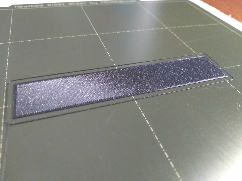 A single-layer calibration print that shows no issues.